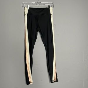 Forever21 legging with black and rose gold stripes. Size small